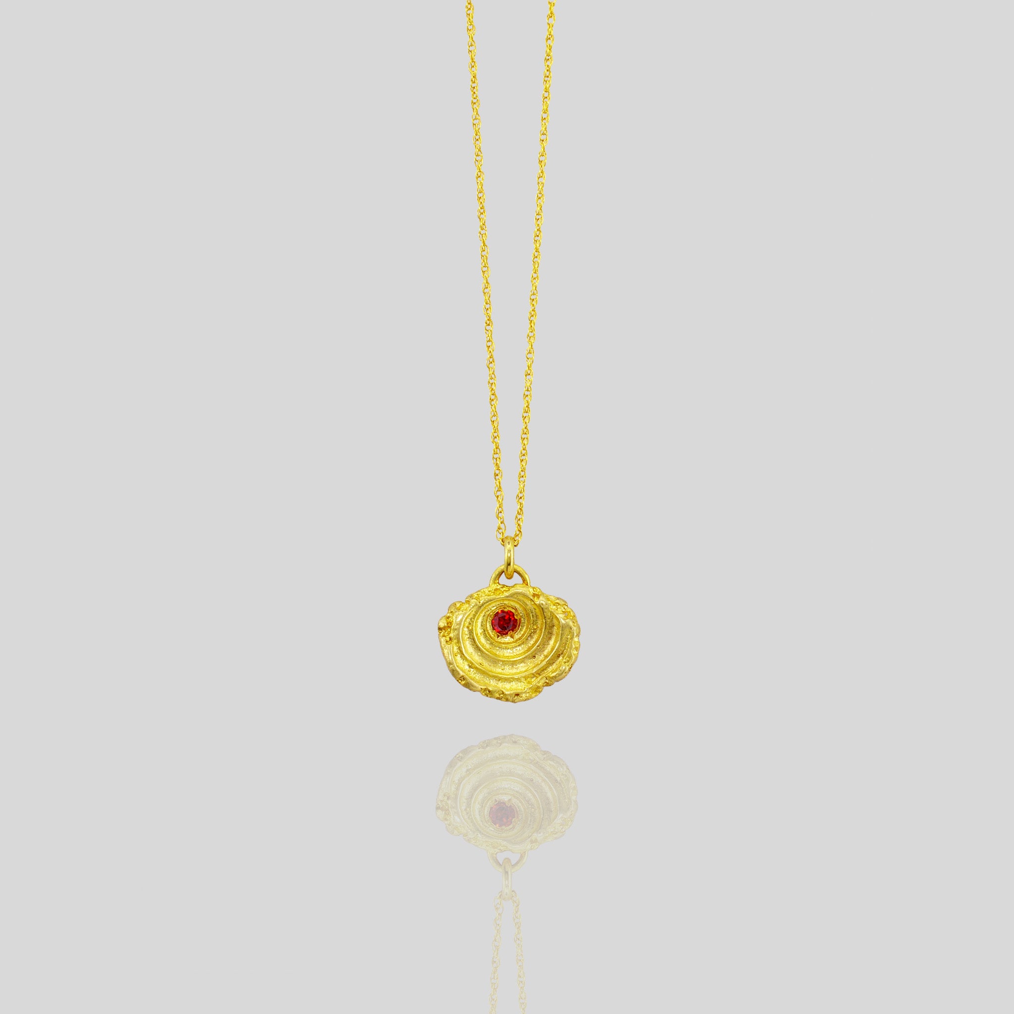 Yellow Gold Seashell pendant with Ruby