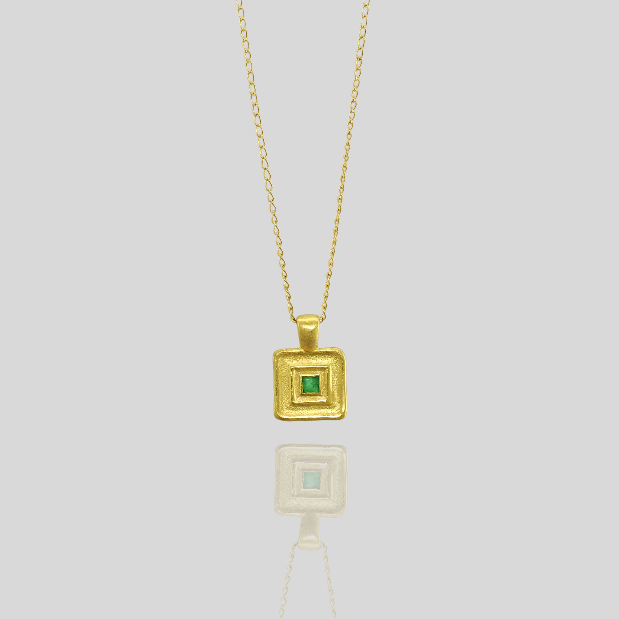 Pharaohs II - Handmade square gold pendant featuring a striking square Emerald gemstone at its heart, crafted from Yellow Gold to mirror the majestic jewelry of ancient Egyptian Pharaohs.