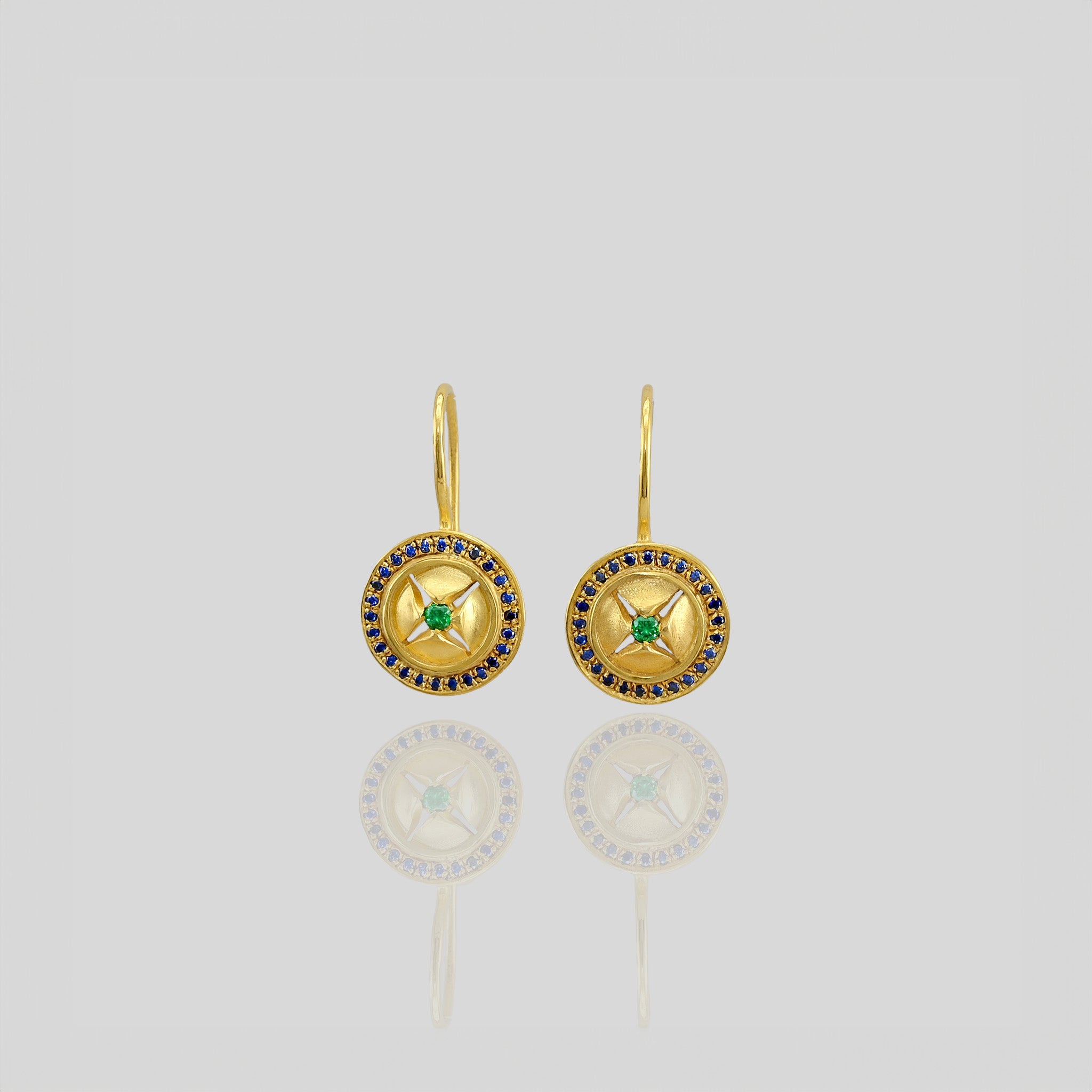 Yellow Gold Round Drop Earrings with Emerald star motif and sparkling Sapphires, exuding sophistication and timeless elegance.