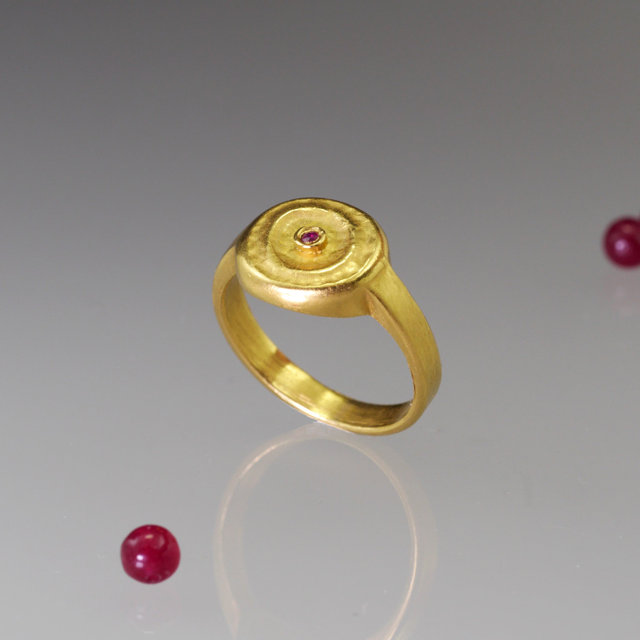 Handmade 18k Gold ring with a central Ruby, exuding vintage charm reminiscent of the Egyptian pharaohs' era.