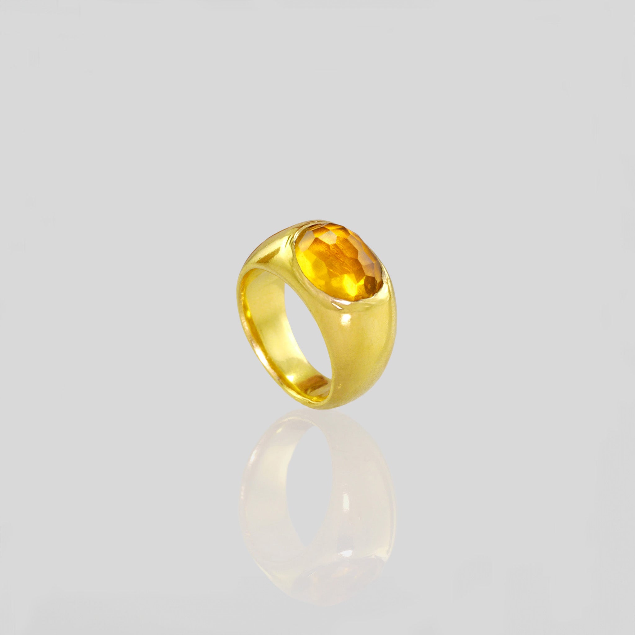 A timeless gold oval ring adorned with a captivating Citrine gemstone. This classic piece exudes traditional elegance and is beloved for its enduring appeal.