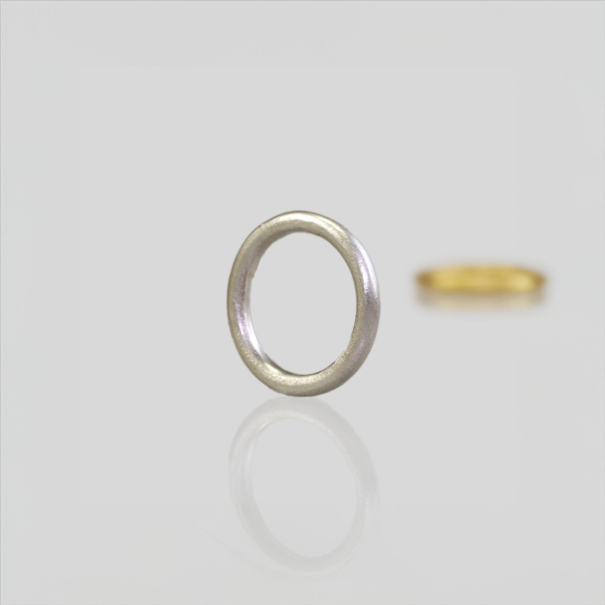 Round profile White Gold wedding ring with minimalist design, perfect for your special occasion.
