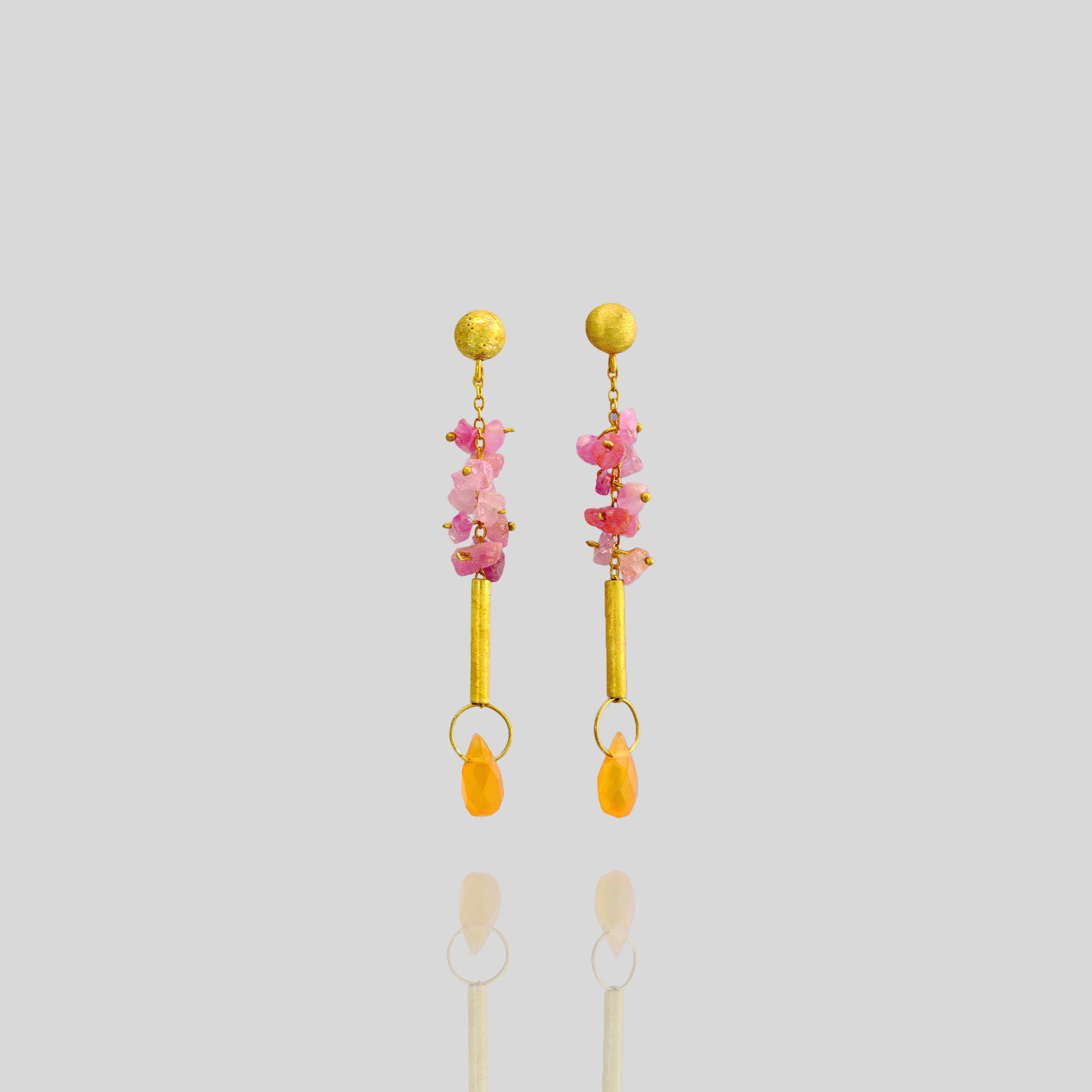Venus Earrings with raw pink Sapphires and Carnelian gemstone drop, exuding timeless elegance and luxury.