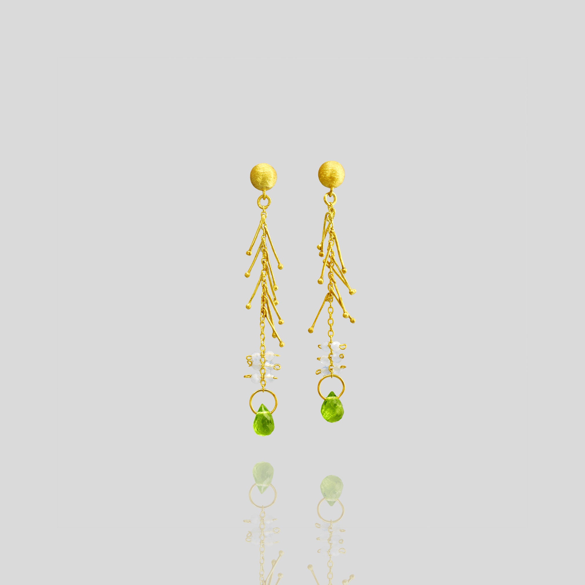 18k Yellow Gold Venus Stud Earrings with Aquamarine and Peridot accents, inspired by the goddess emerging from the sea. Light and fluid, adding celestial charm to any look.