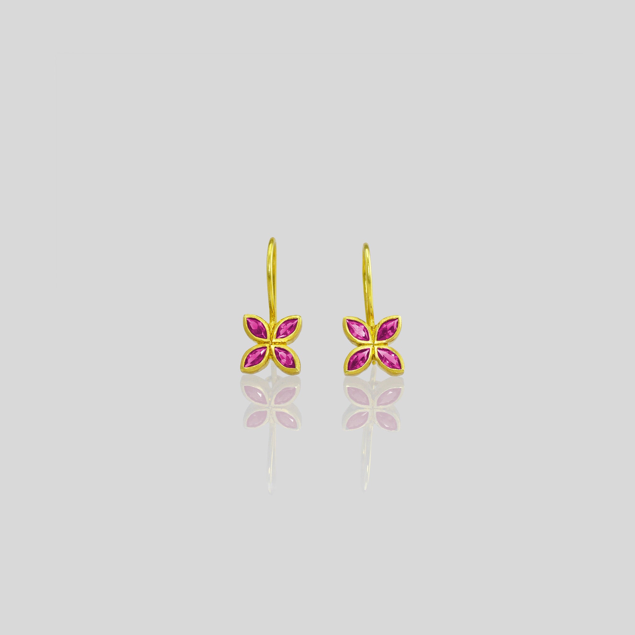 Dazzling Ruby flower earrings, crafted from 4 marquise gemstones. Lightweight, colorful and vibrant.