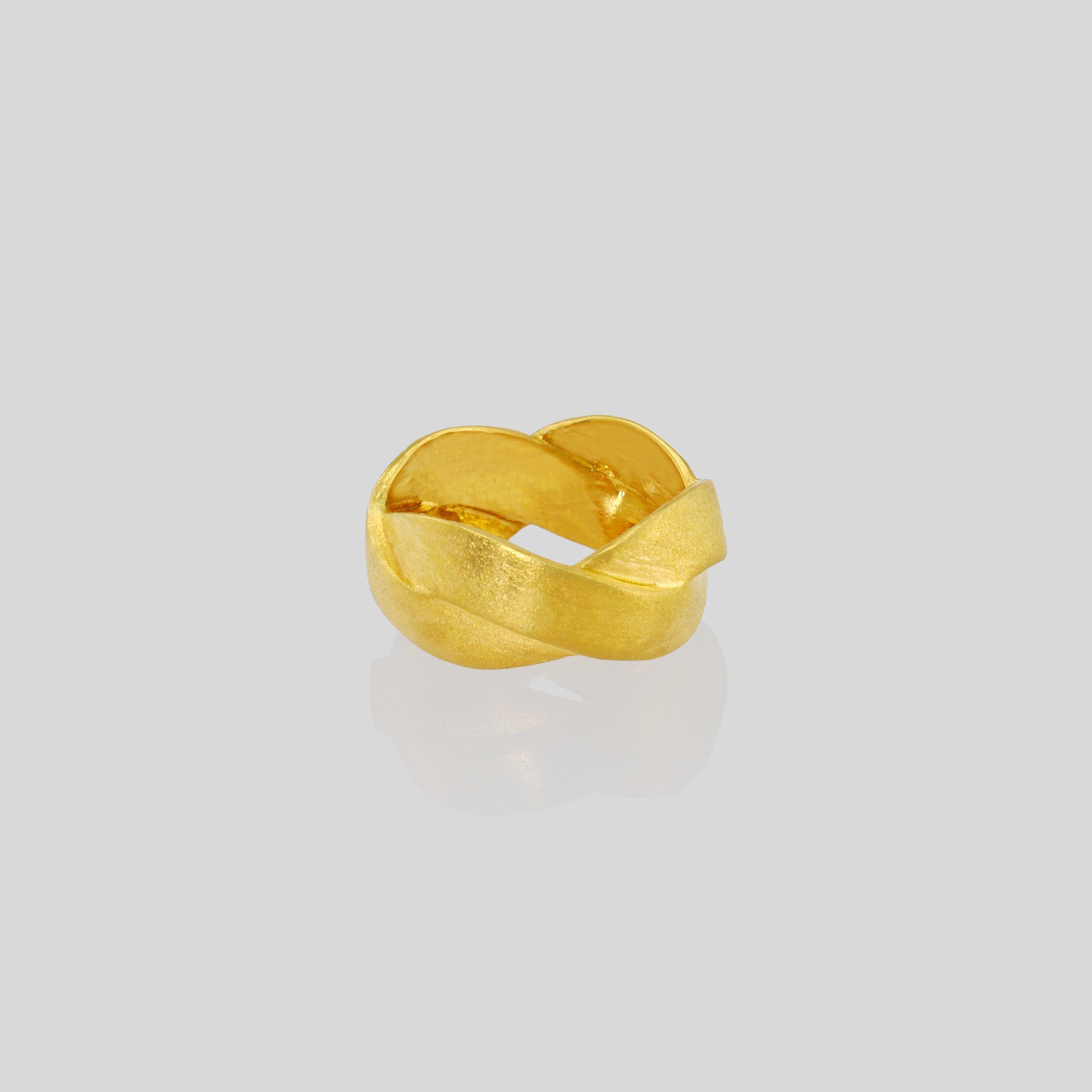 Handmade 18k Gold ring with braided bands, offering an elegant and versatile addition to both everyday wear and special occasions. A timeless classic with a unique twist.