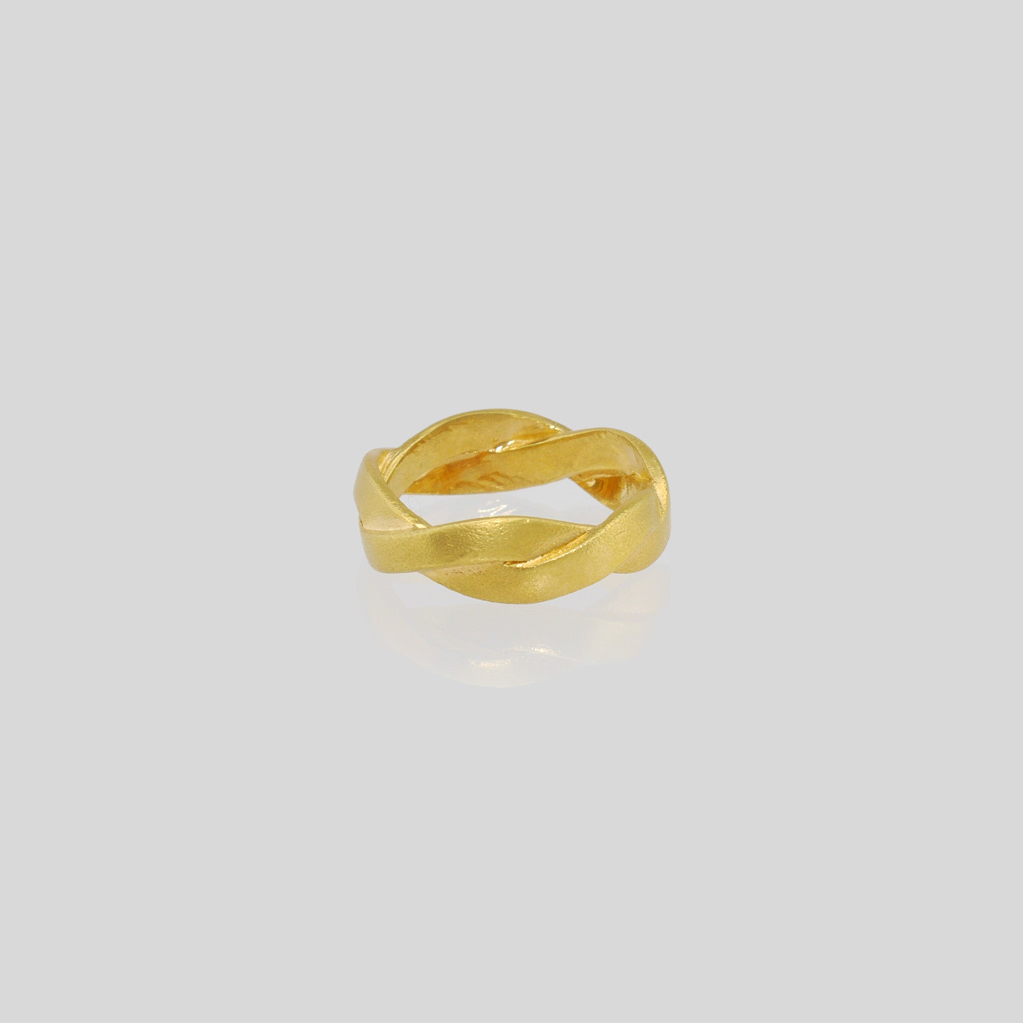 Hand-crafted ring made from Yellow Gold braids, offering an elegant and timeless touch to any attire. Intricately designed with subtle sophistication