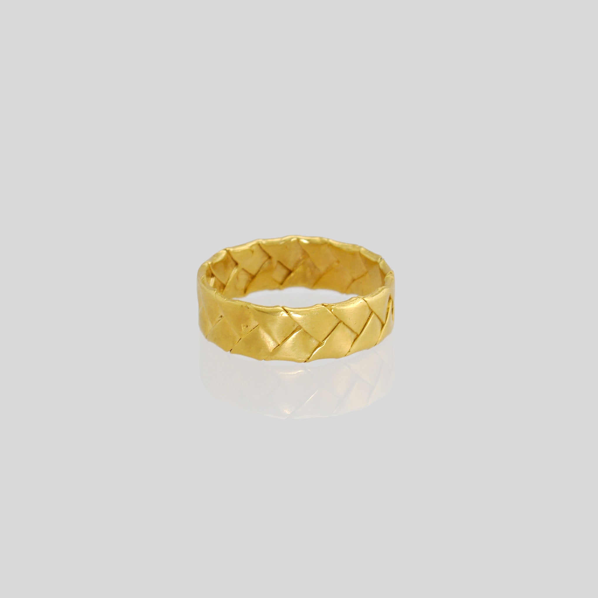 Gold Braid Ring crafted from intertwined gold strands, meticulously modeled using a unique paper processing technique. Clean, precise, and versatile, suitable for daily wear.